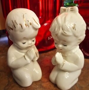 Vintage Porcelain Praying Boy And Girl Salt And Pepper Shakers With Gold Trim.